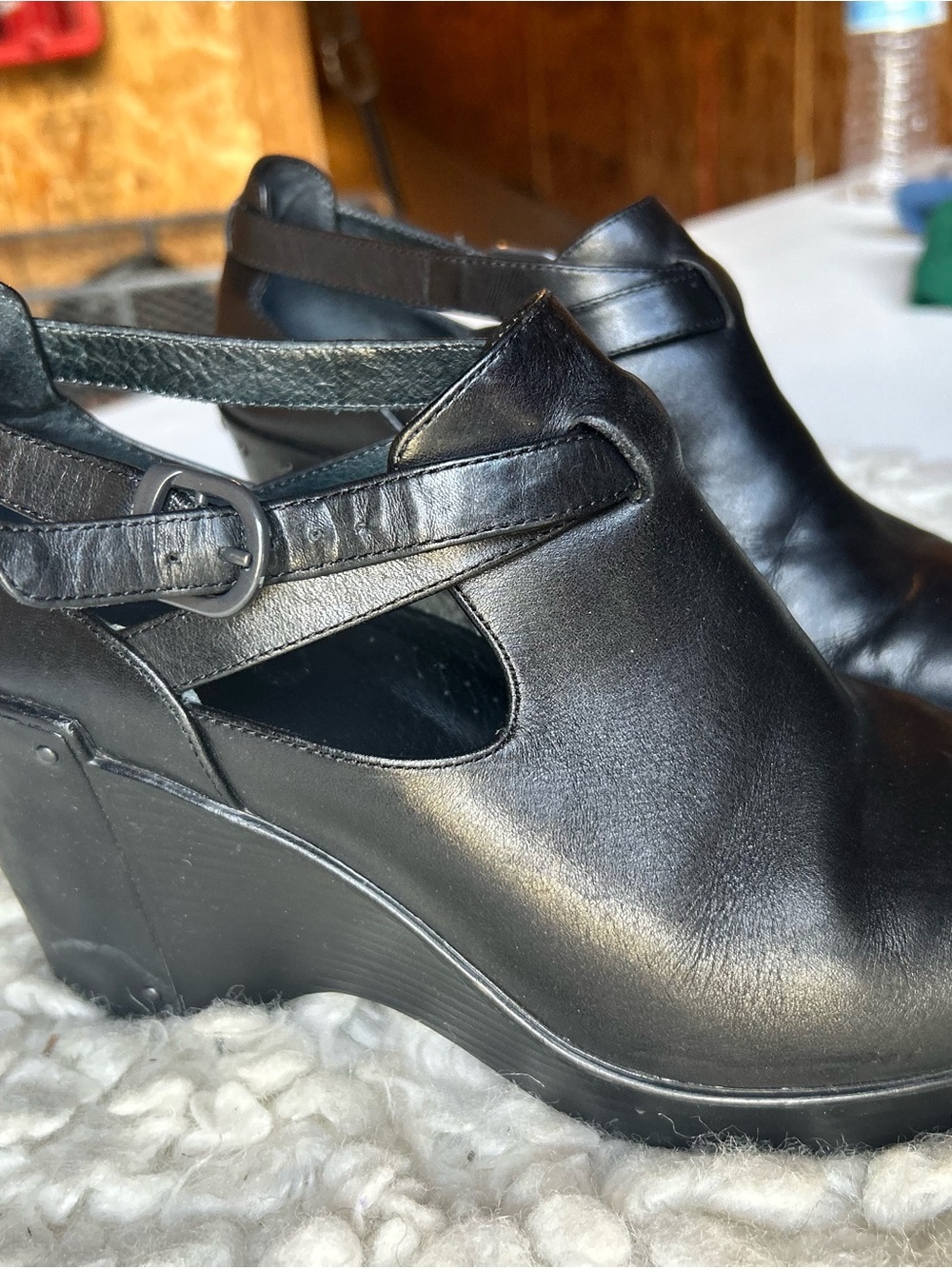 Dansko Black Leather Wedge Mules with Buckle Strap